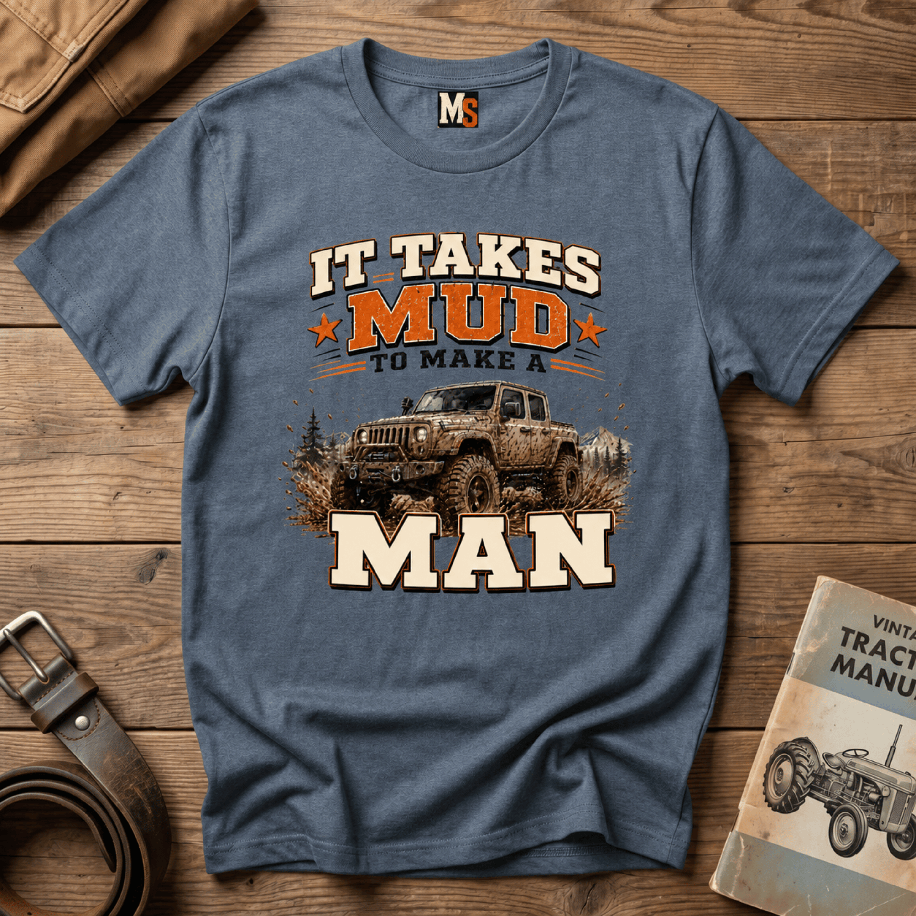 It takes mud to make a man T-shirt