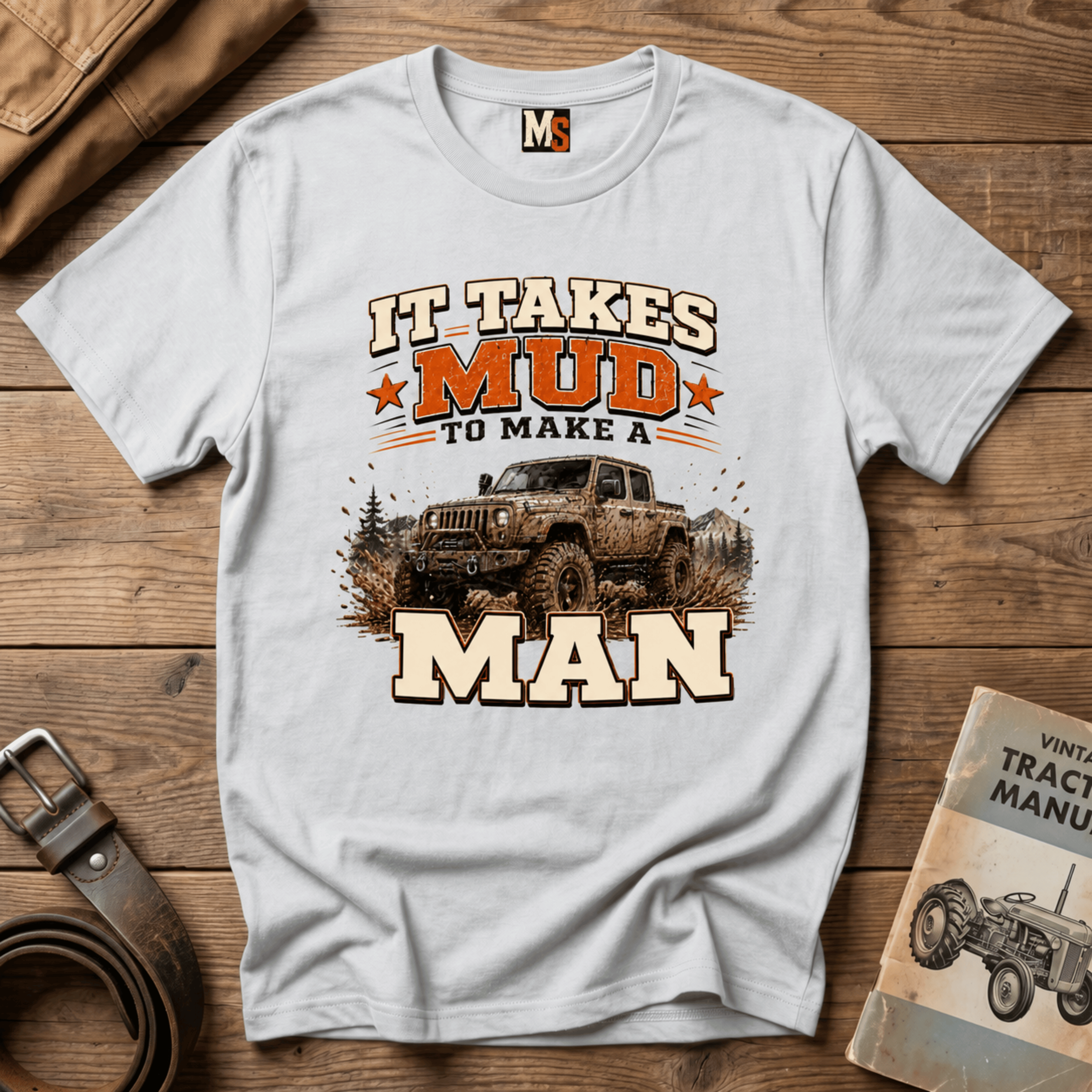 It takes mud to make a man T-shirt