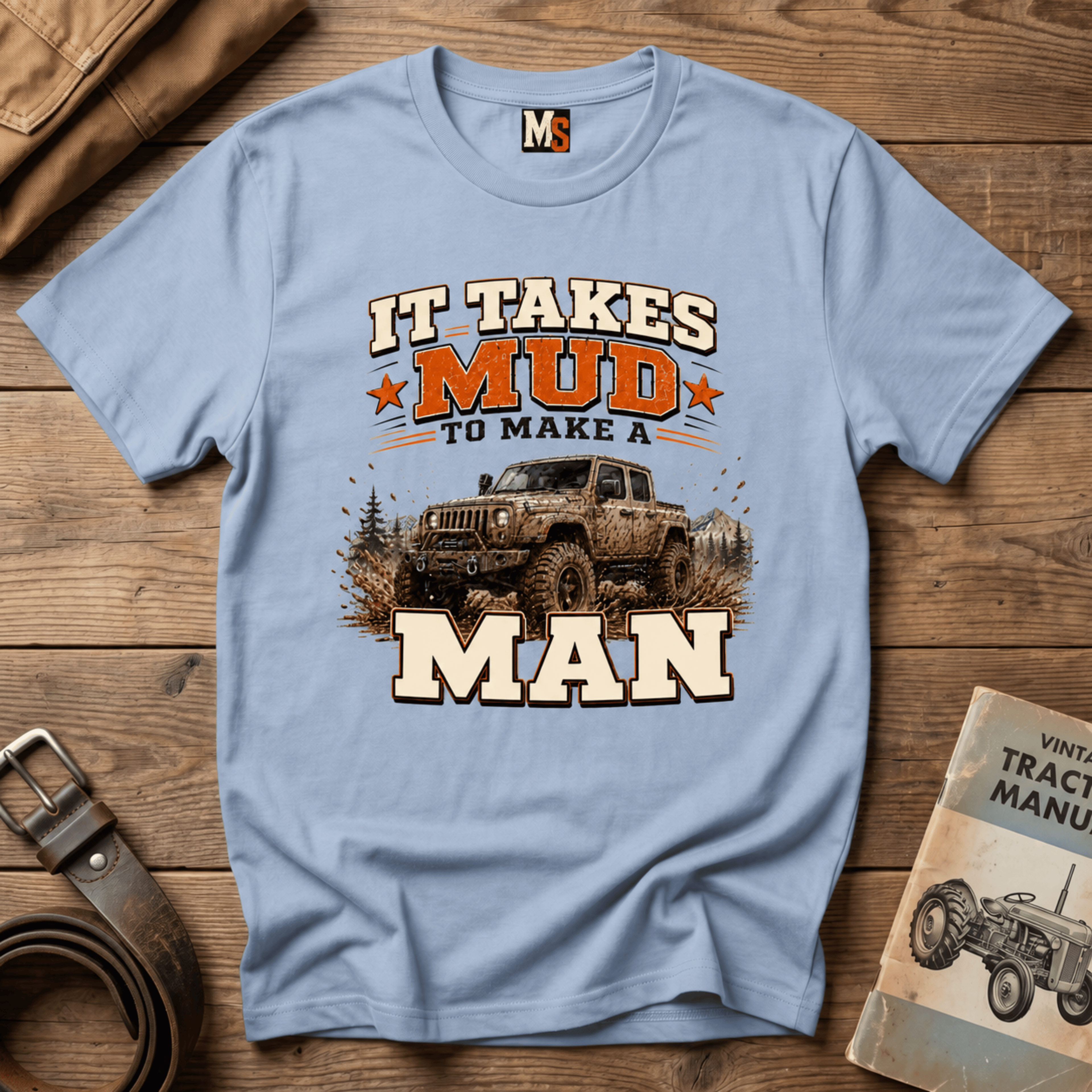 It takes mud to make a man T-shirt