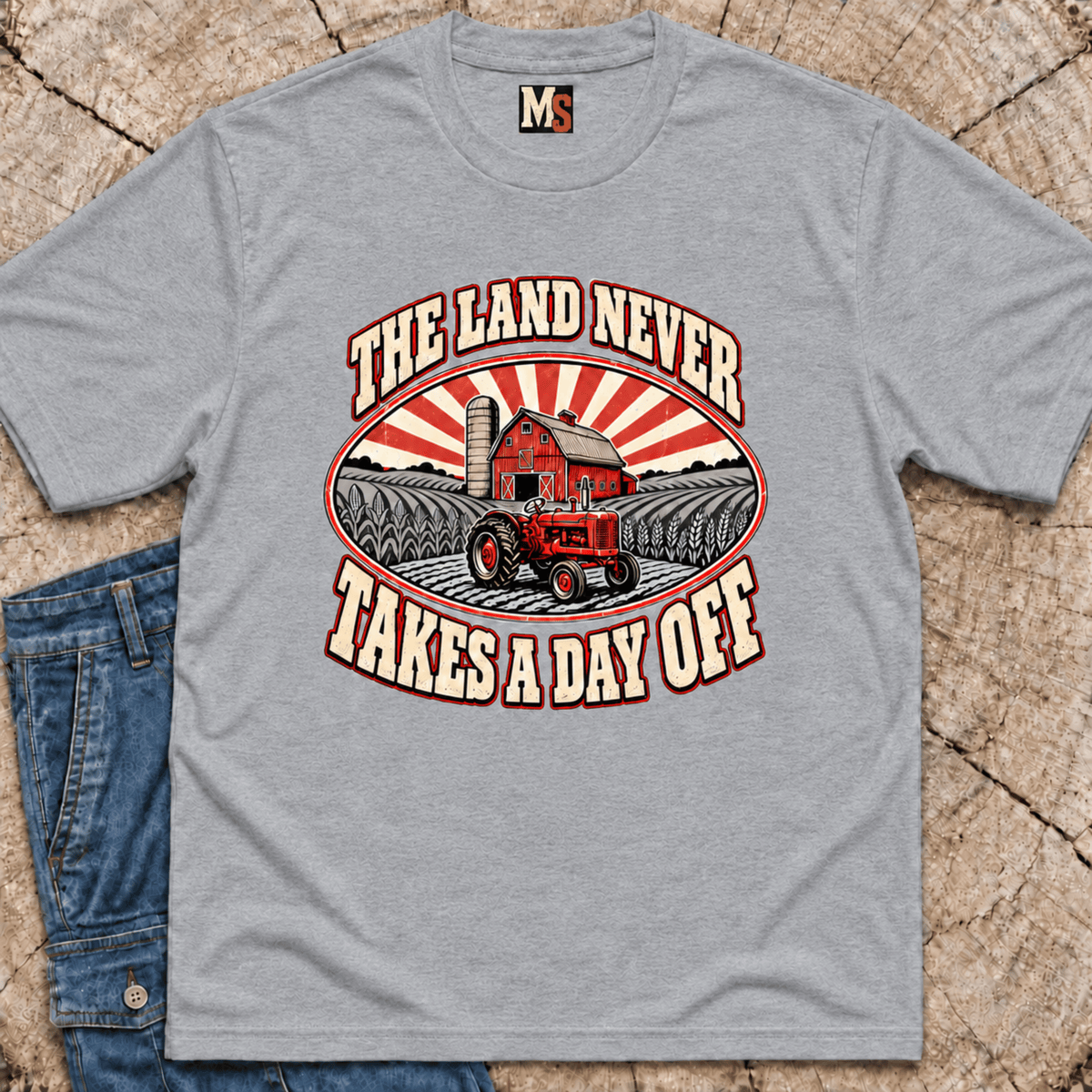 The Land never takes a day off T-shirt